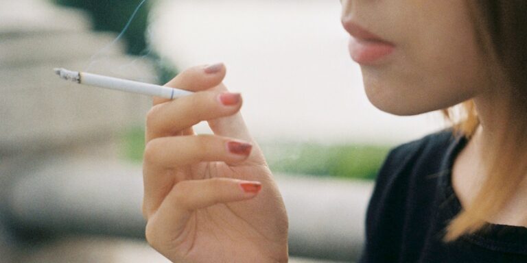 woman smoking cigarette